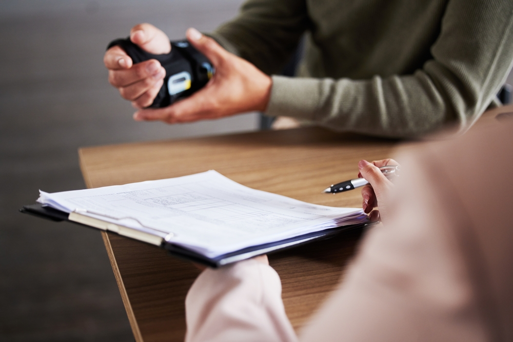 Hand injury, document and man compensation paperwork